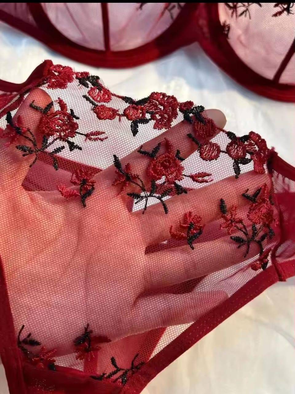 sexy red lingerie set with floral print, bow detail, random pattern.